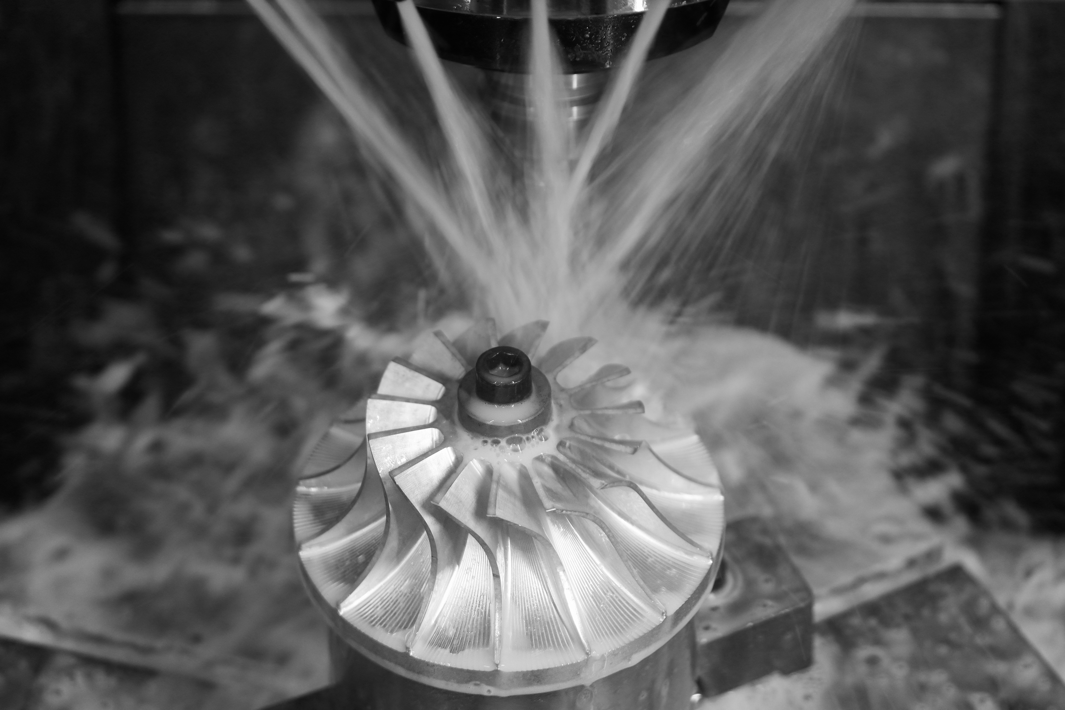 Precision CNC milling of turbine impeller with coolant spray