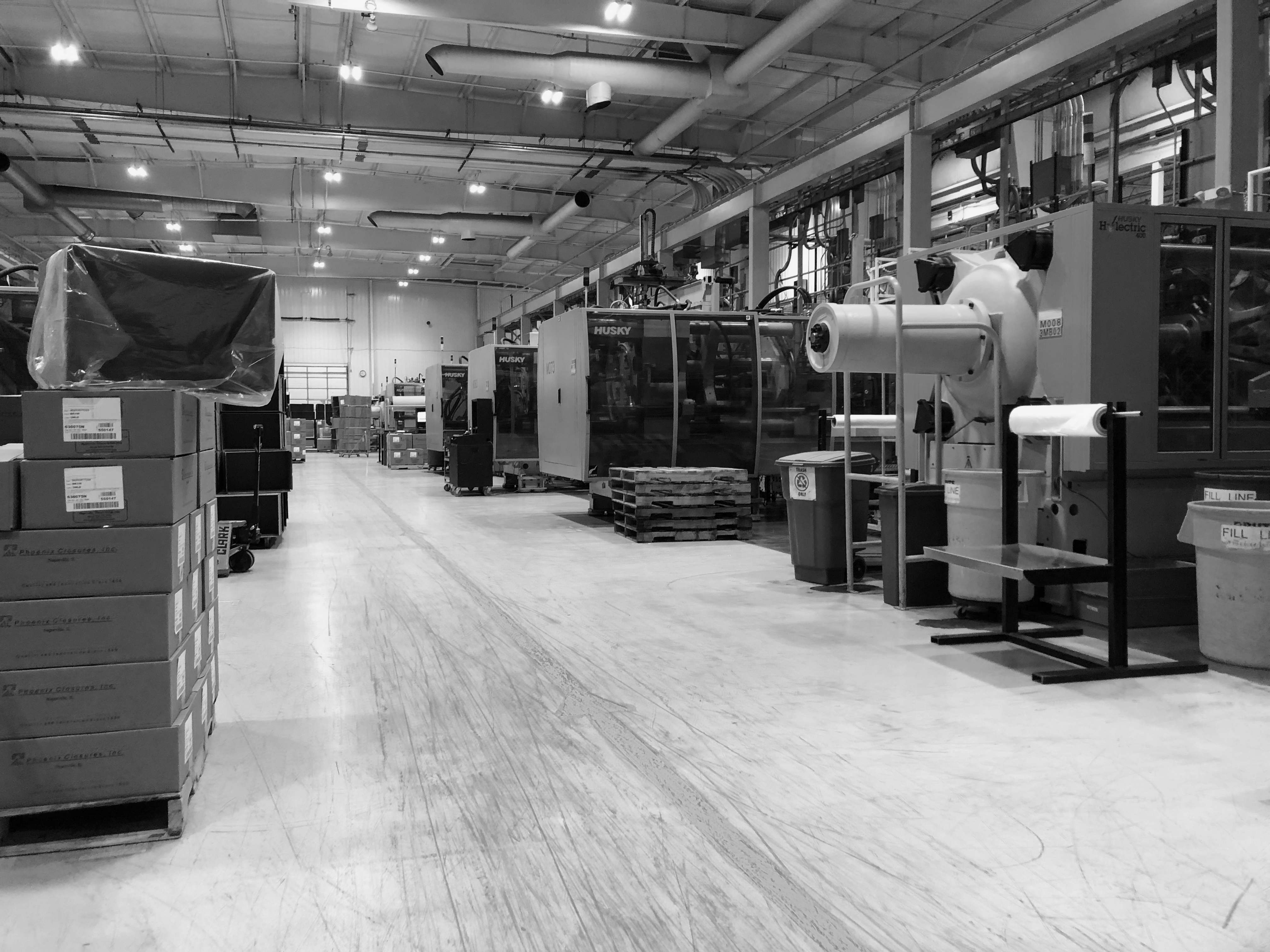 Plastics injection molding facility with Husky equipment