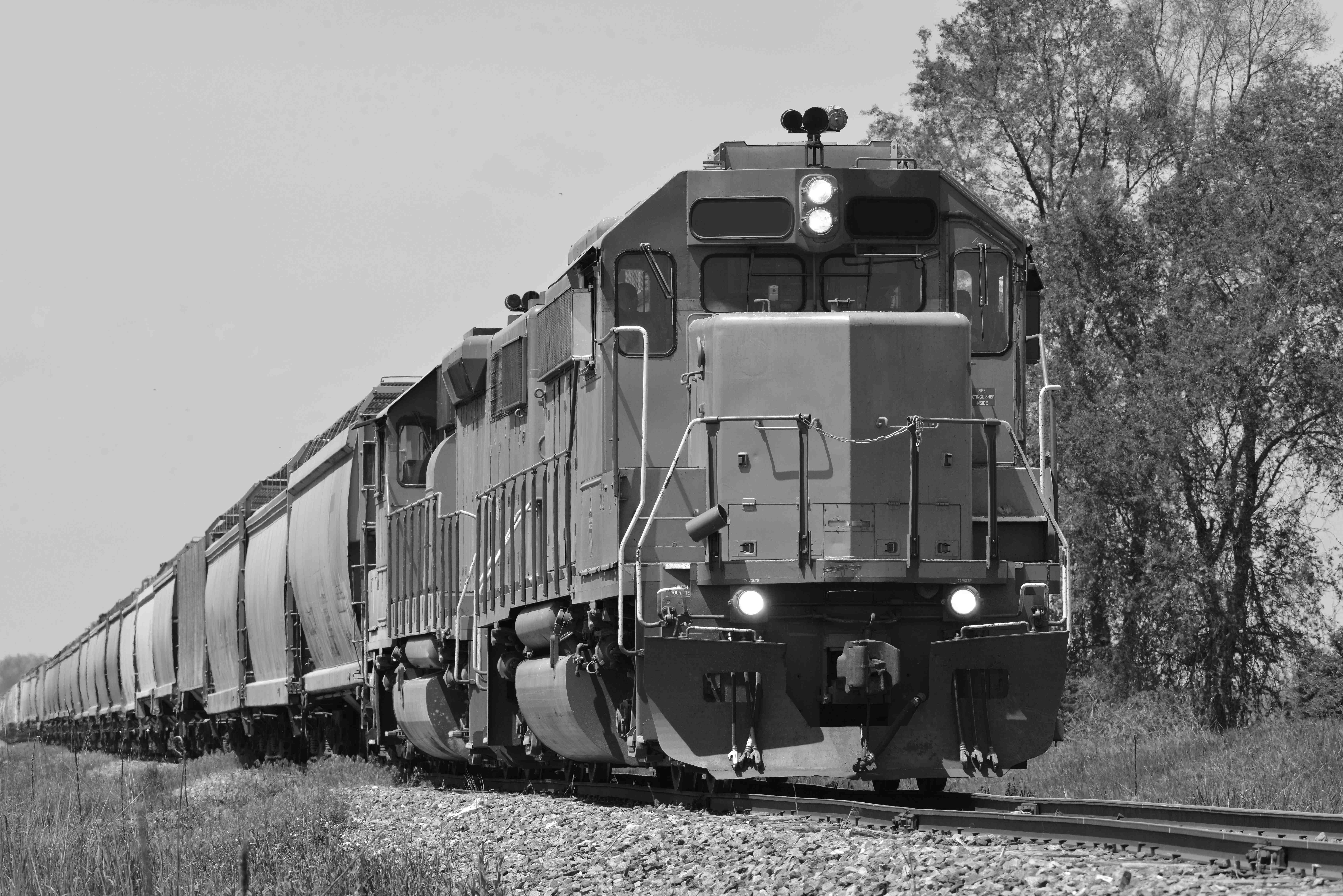 Freight train locomotive on railroad tracks