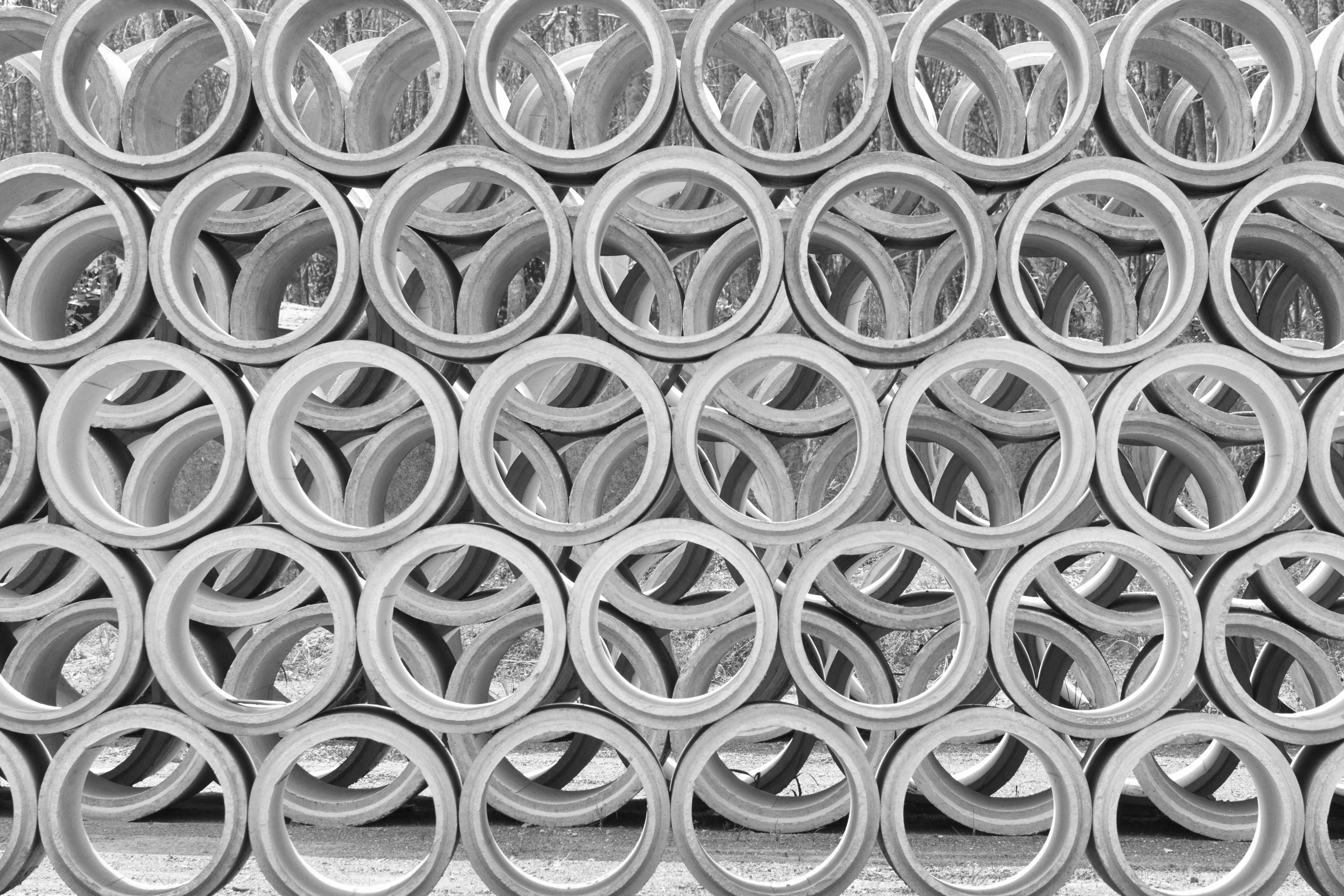 Stacked concrete pipes at manufacturing facility
